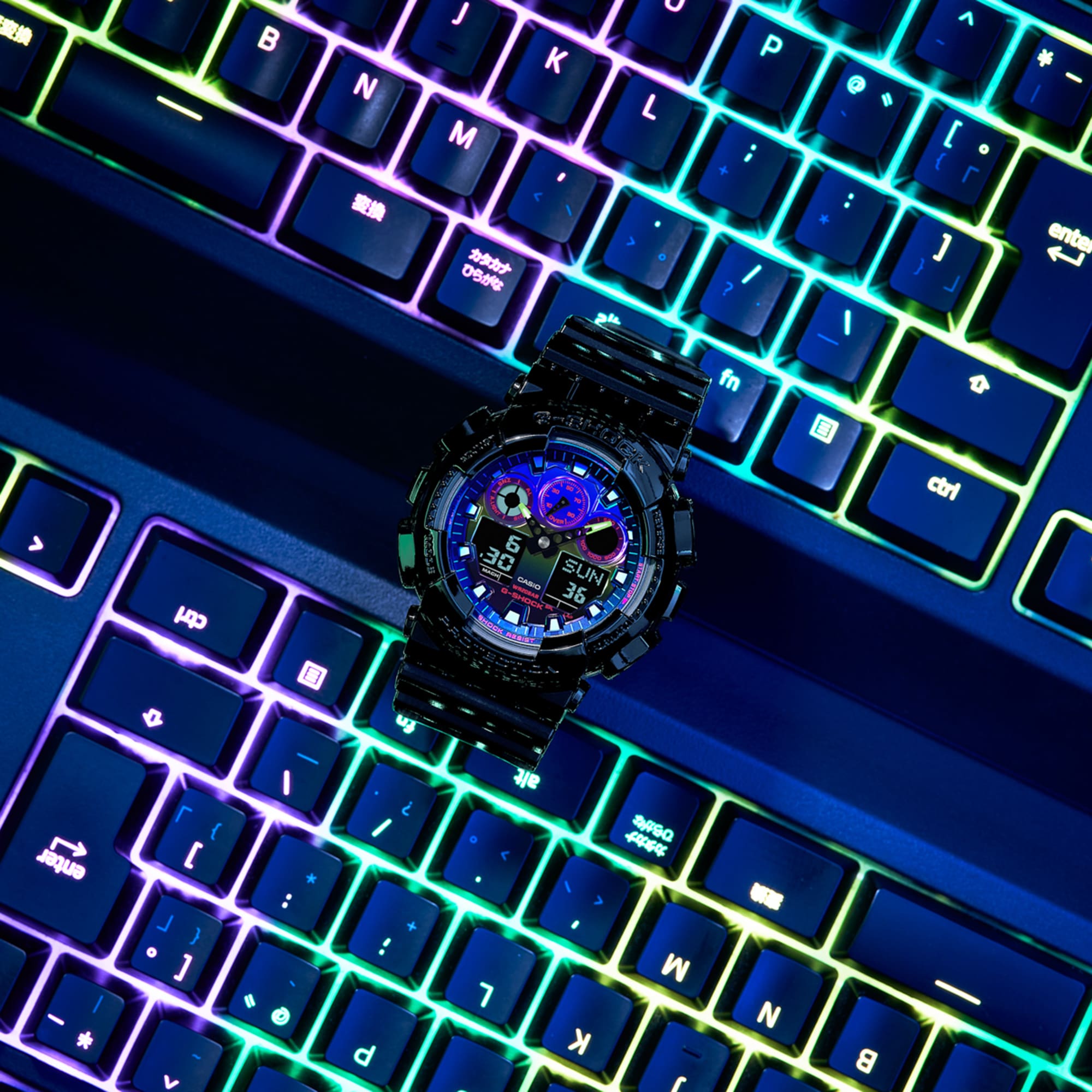 G-SHOCK RGB Gamer watch on a rainbow backlighted keyboard