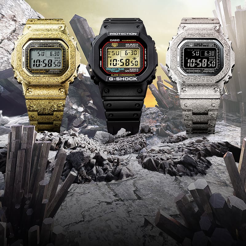 Three Project Team Tough watches on a cracked and crystaline landscape