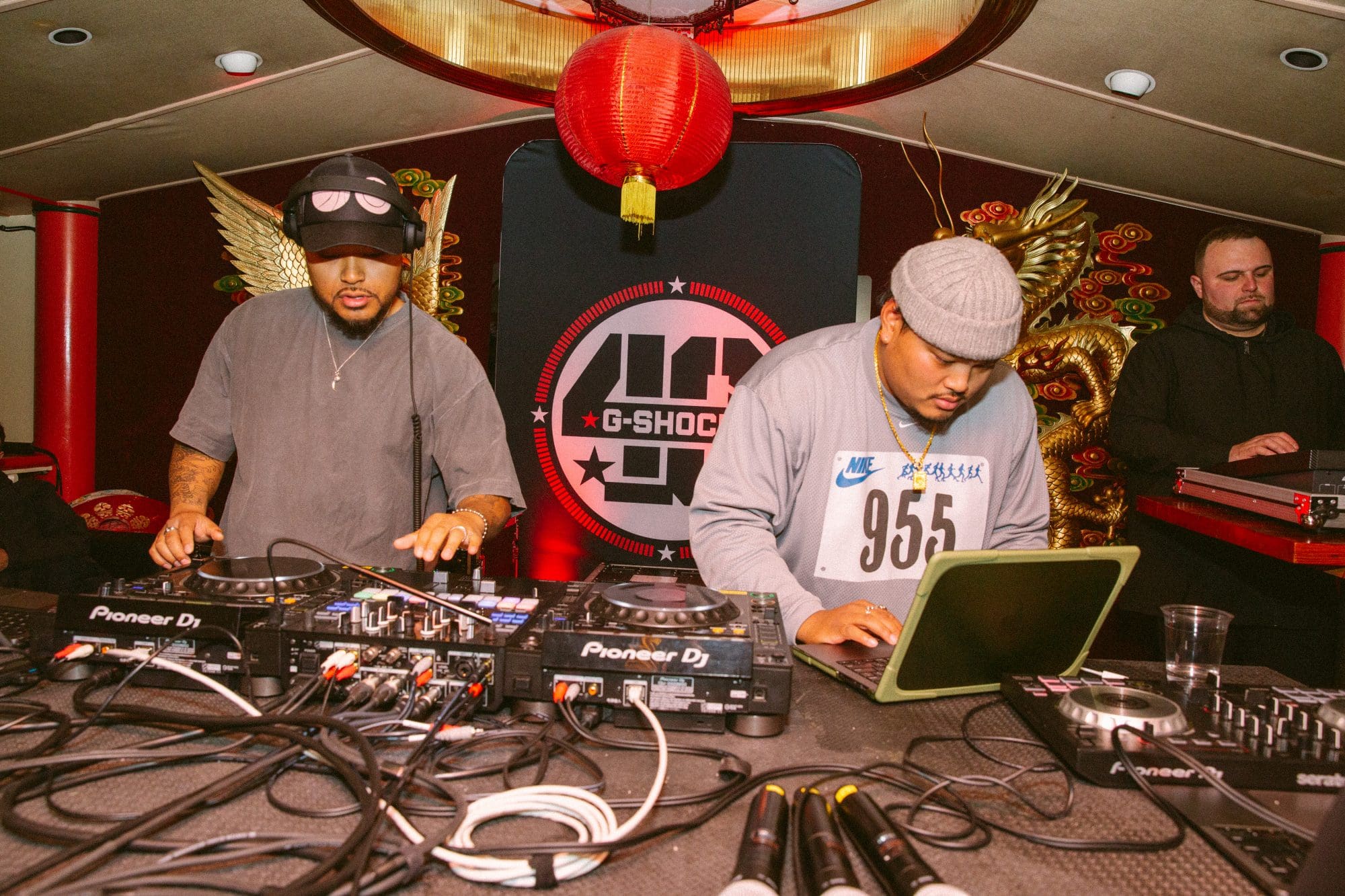 DJ booth of the Bodega x G-SHOCK watch launch party with two DJ's spinning