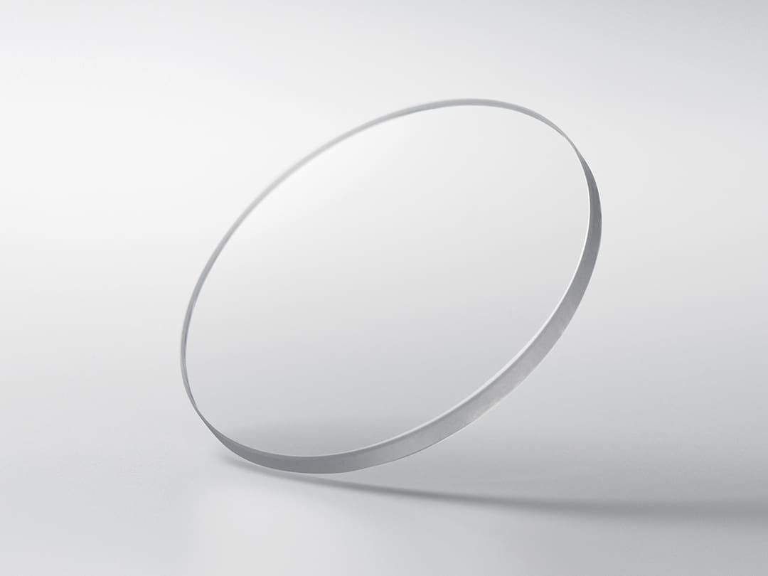 Scratch-resistant, highly transparent sapphire crystal with an anti-reflective coating