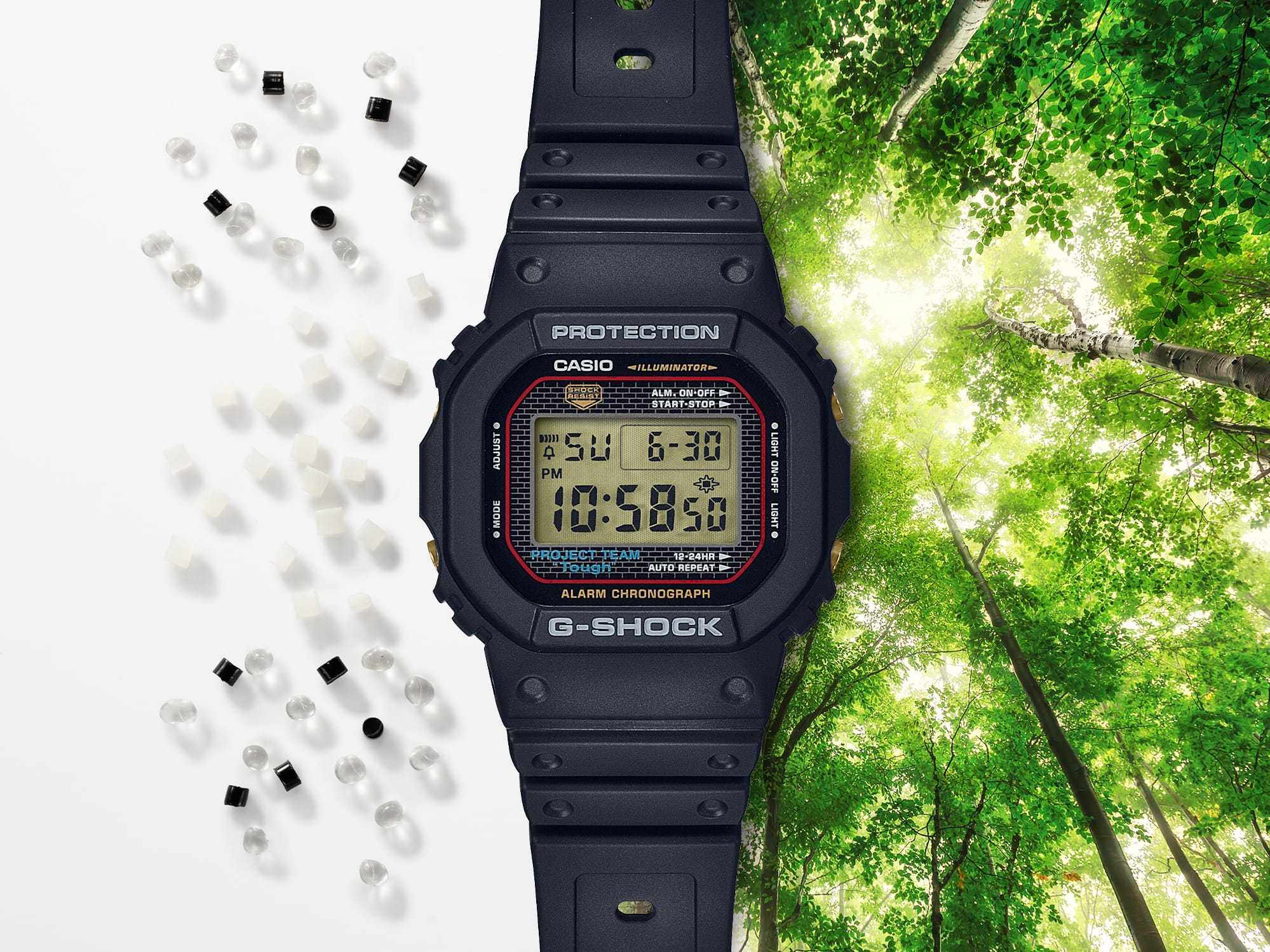Digital G-Shock watch with Bio-mass beads and tree in the background