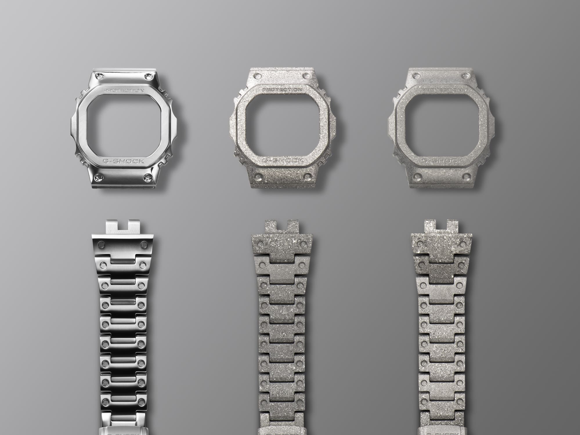 Three bezel and bands, Ion plated, silver, and marble band connections