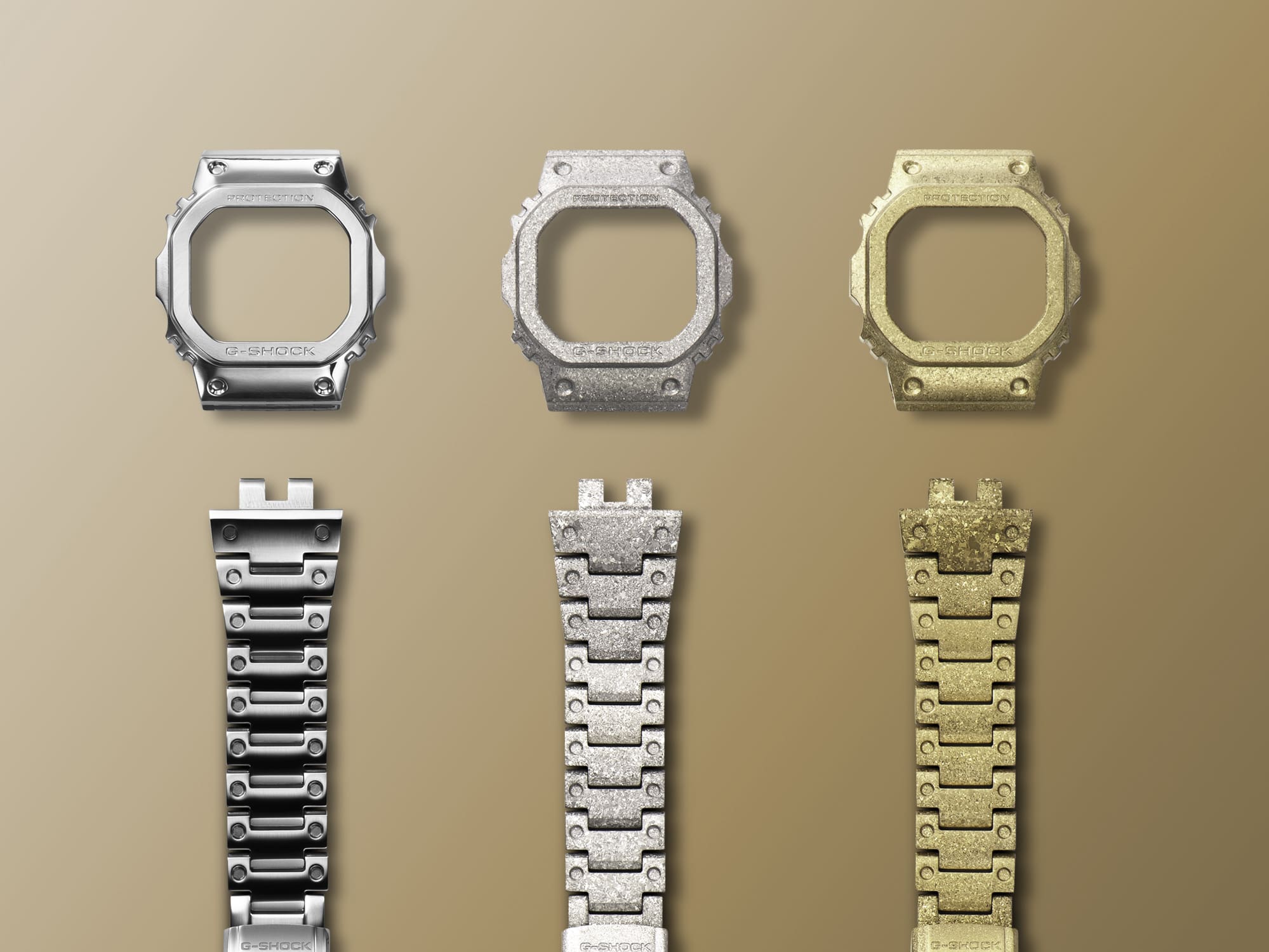Three bezel and bands, Ion plated, gold, silver, and marble band connections