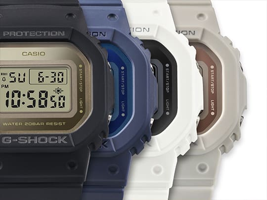 GMDS5600 watch lineup with metallic face in black, blue, white, and gray