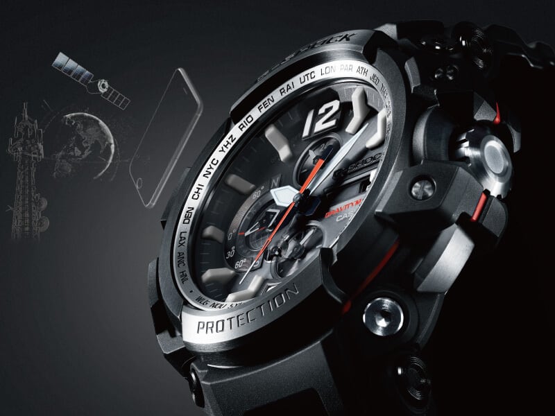 Analog Digital G-SHOCK watch with satellite and mobile device illustration in the background