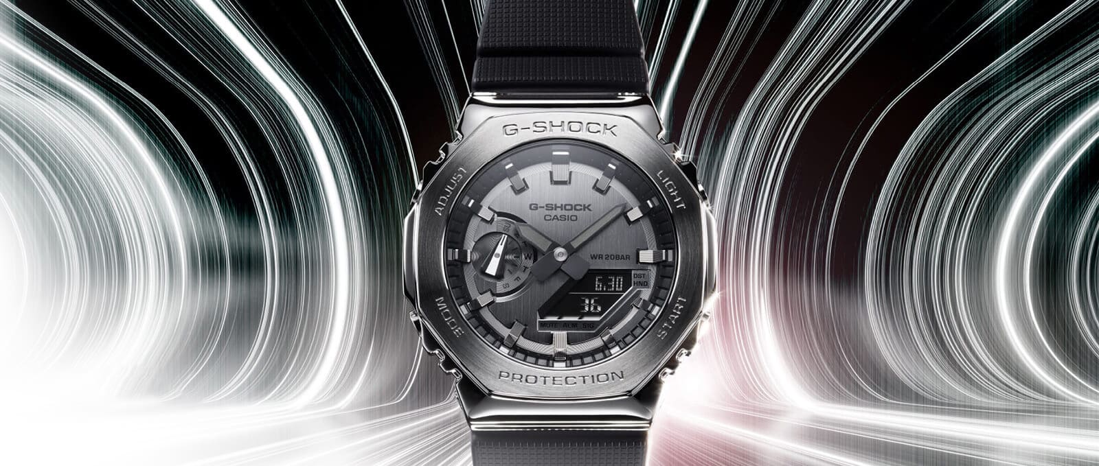 GM2100 watch with silver face and black band