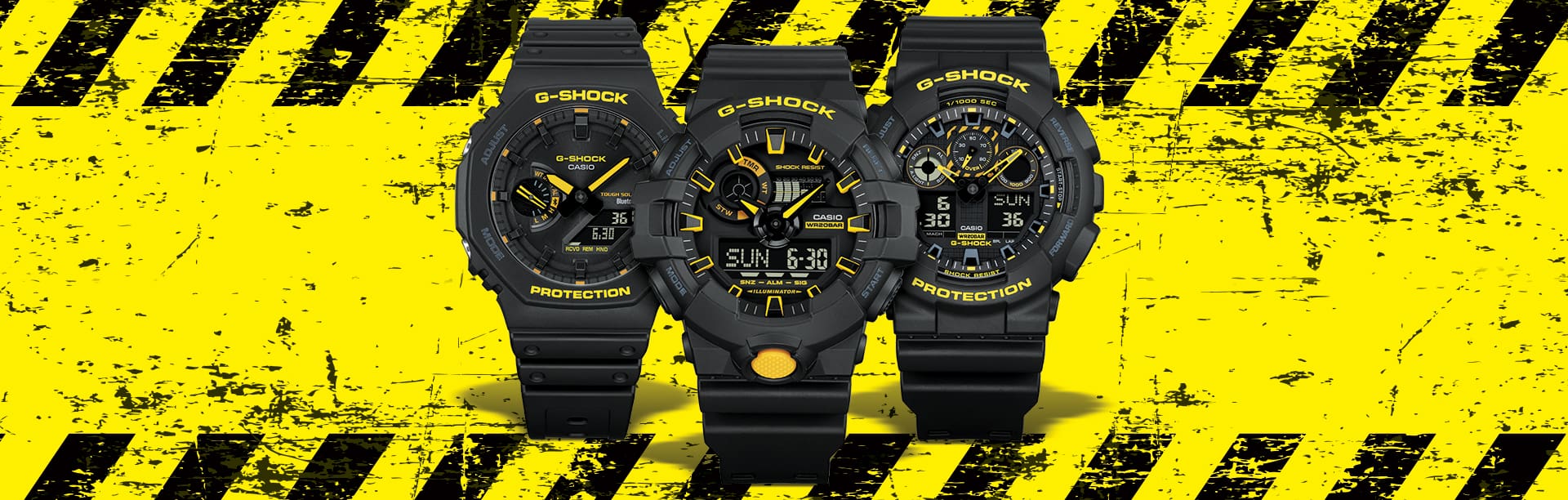 G-SHOCK GWB5600CY-1, GAB2100CY-1A, GA100CY-1A, and GA700CY-1A on a yellow background