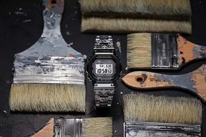 GMWB5000EH-1 watch organized between paint brushes