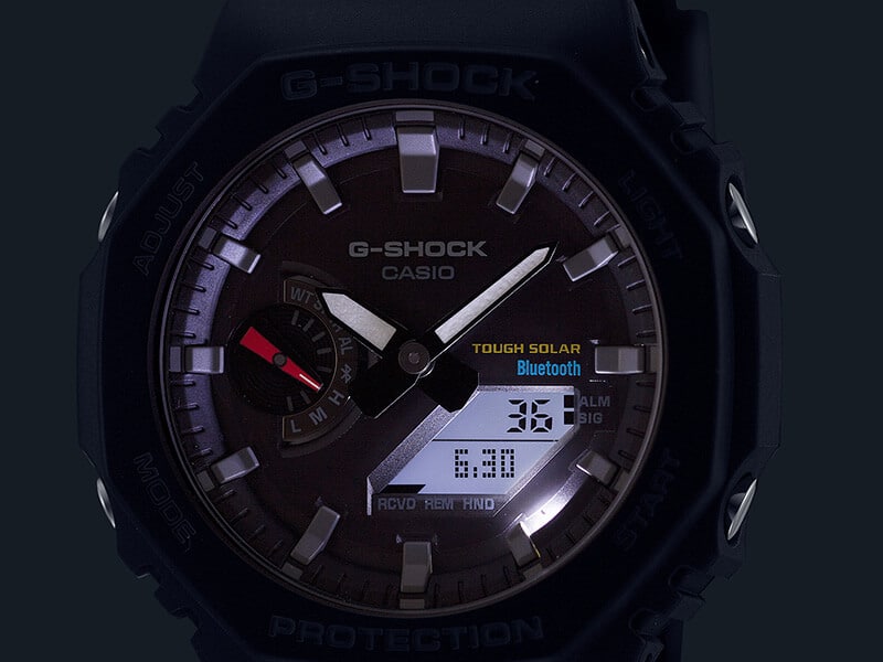 close up of GAB2100-1A in dark environment with illuminated super led light show watch face