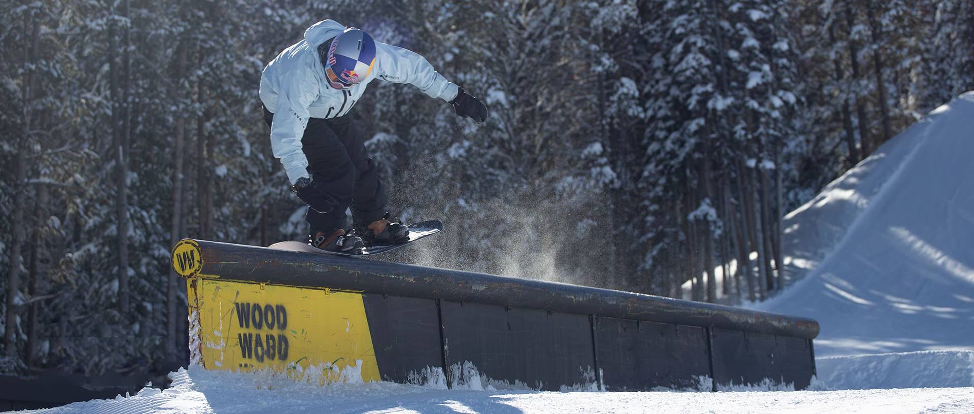 Jake Canter rail riding on a snowboard 