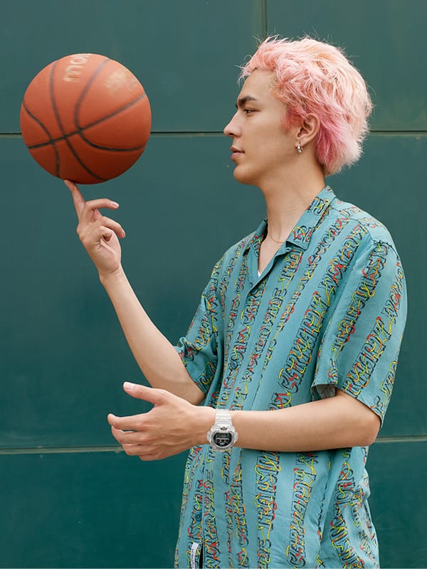 Basketball player wearing a G-SHOCK digital Clear remix watch
