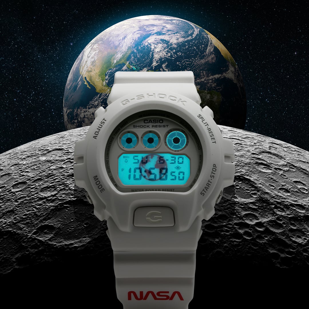 G-SHOCK DW6900NASA23 White Digital limited edition NASA watch in front of Earth rising