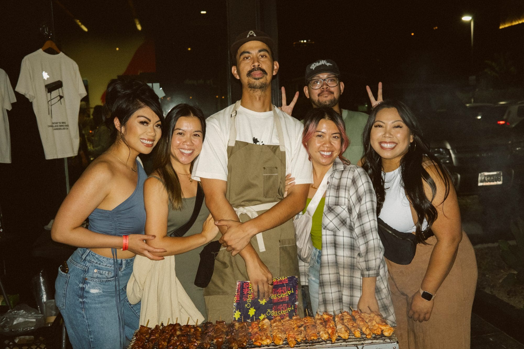 Attendees and Yakitori caterer outside of UNDEFEATED x G-SHOCK pre-launch event at UNDEFEATED Silver Lake