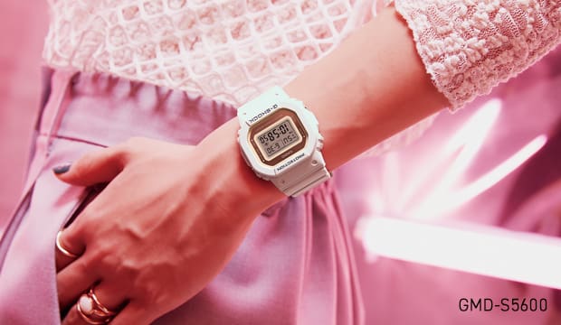 White G-SHOCK GMD-S5600 digital watch in a pink environment