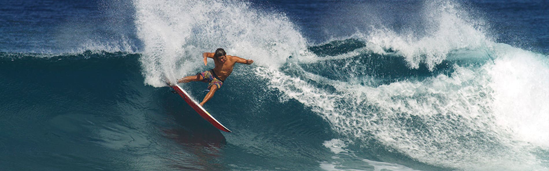 Surfer Surfing on a wave - watch banner